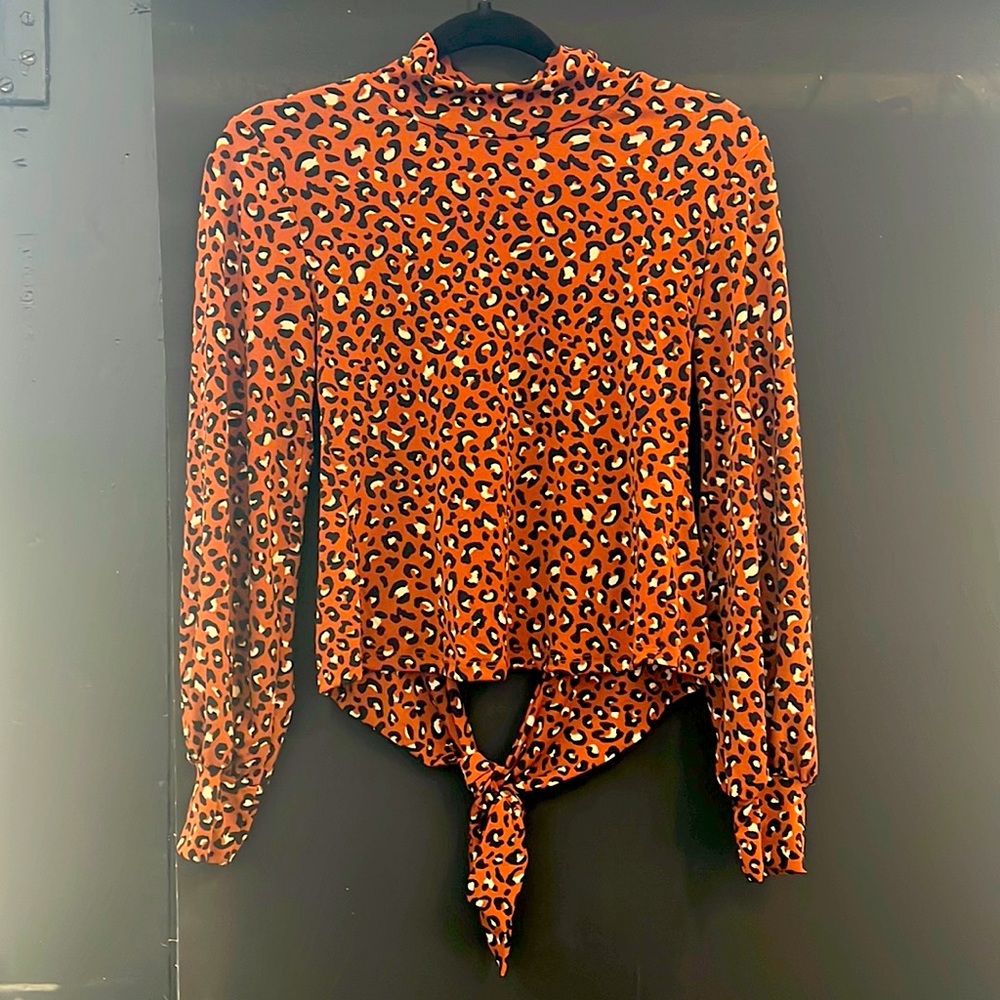 Lush leopard open back shirt